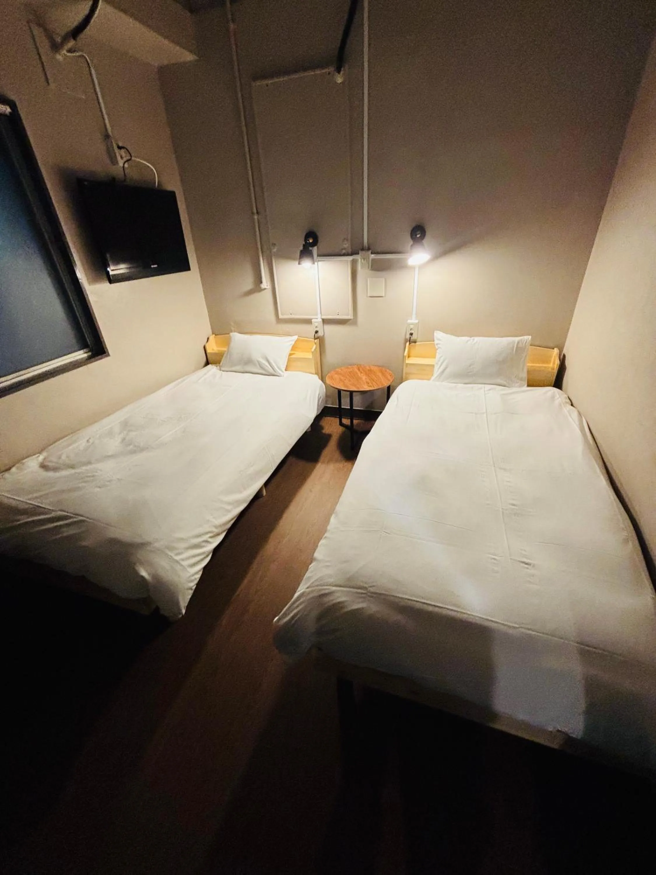 Bed in Wasabi Mita Hotel