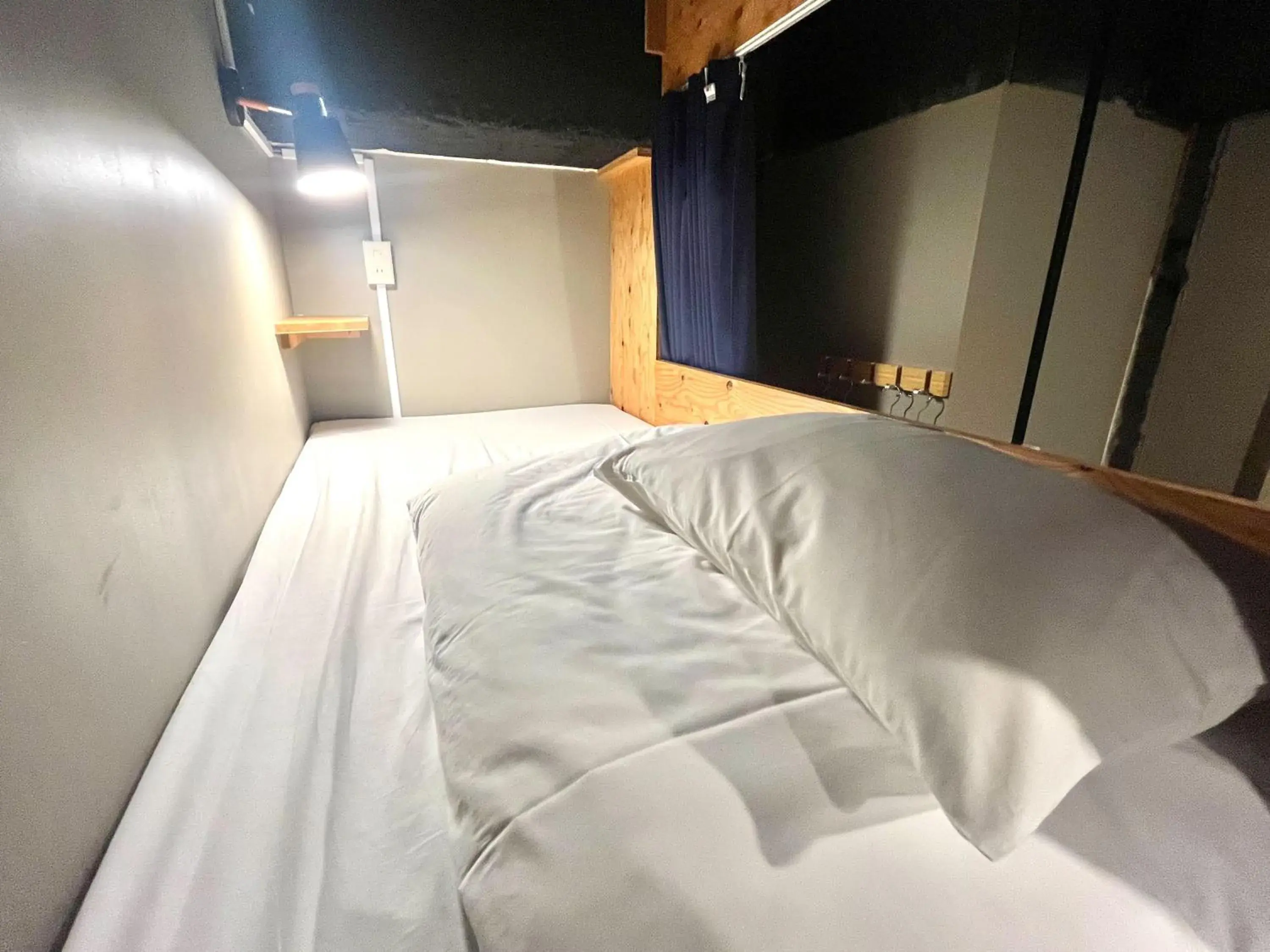 Bed in Wasabi Mita Hotel Bed in Wasabi Mita Hotel