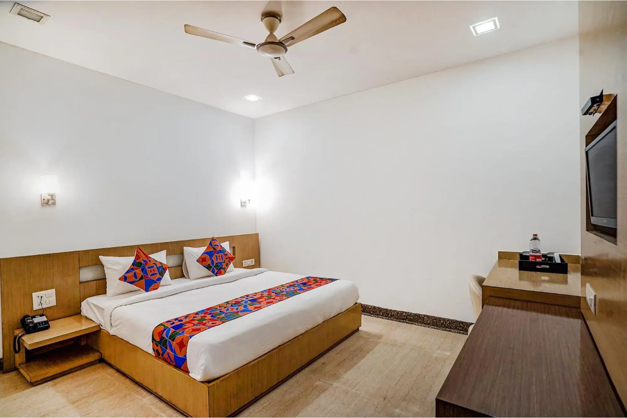 Communal lounge/ TV room, Bed in FabExpress Vasundhara Suits Communal lounge/ TV room, Bed in FabExpress Vasundhara Suits