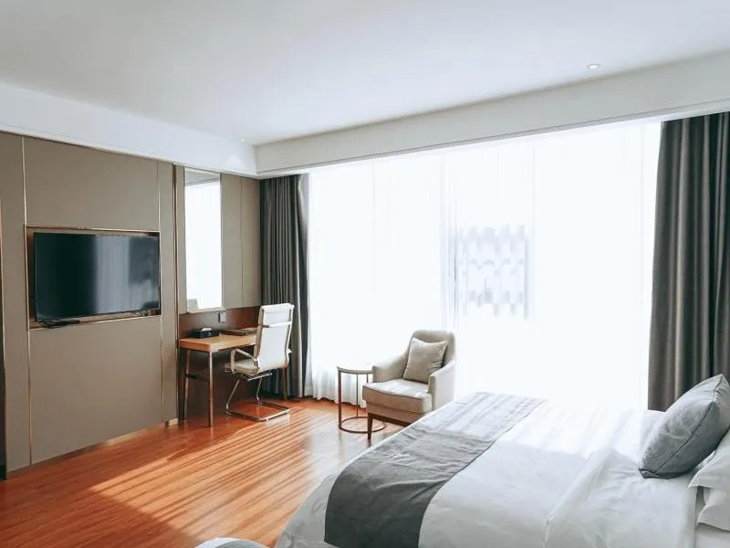 Bed in GreenTree Eastern Hotel Anshun Anshun Zhenning Huangguoshu