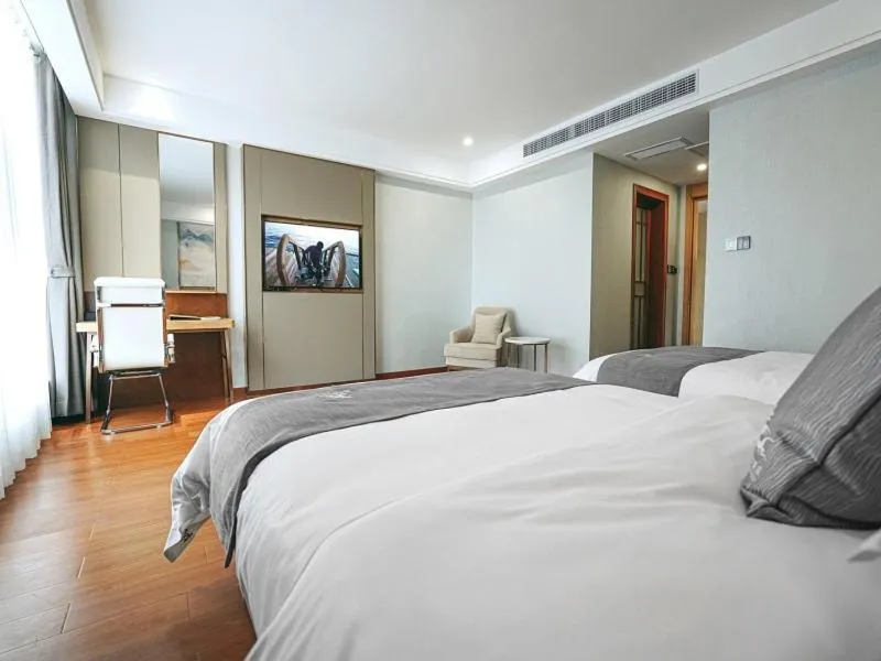 Bed in GreenTree Eastern Hotel Anshun Anshun Zhenning Huangguoshu