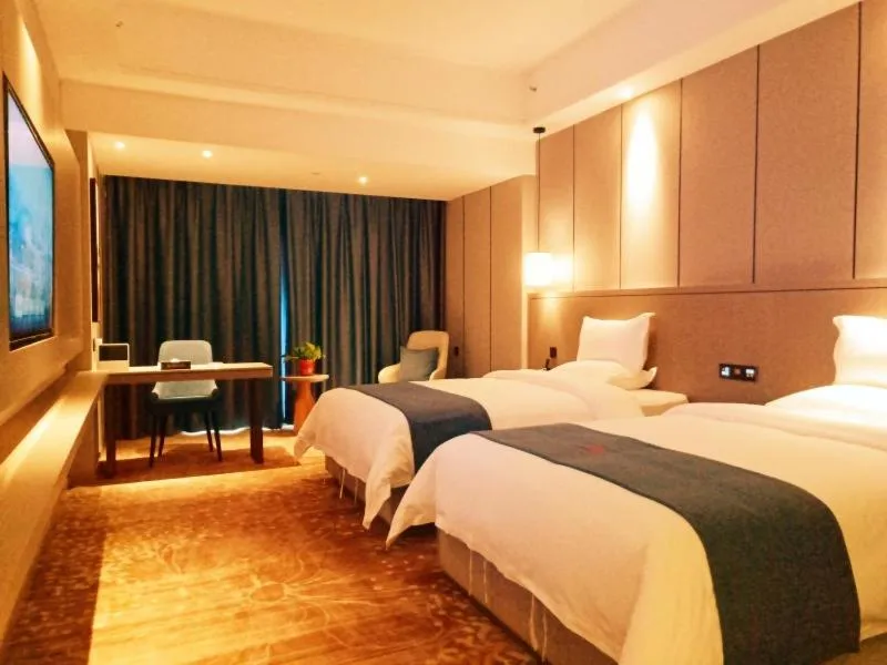 Bed in GreenTree Eastern Hotel Anshun Anshun Zhenning Huangguoshu