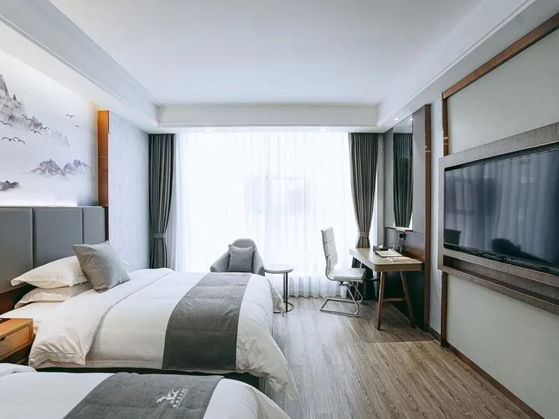 Bed in GreenTree Eastern Hotel Anshun Anshun Zhenning Huangguoshu