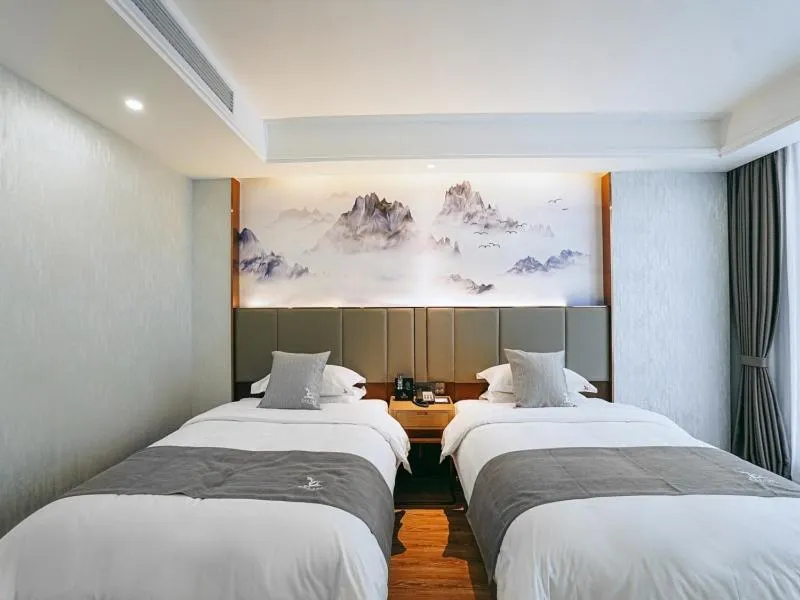 Bed in GreenTree Eastern Hotel Anshun Anshun Zhenning Huangguoshu