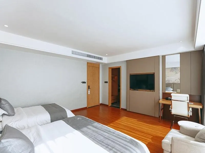 Bed in GreenTree Eastern Hotel Anshun Anshun Zhenning Huangguoshu