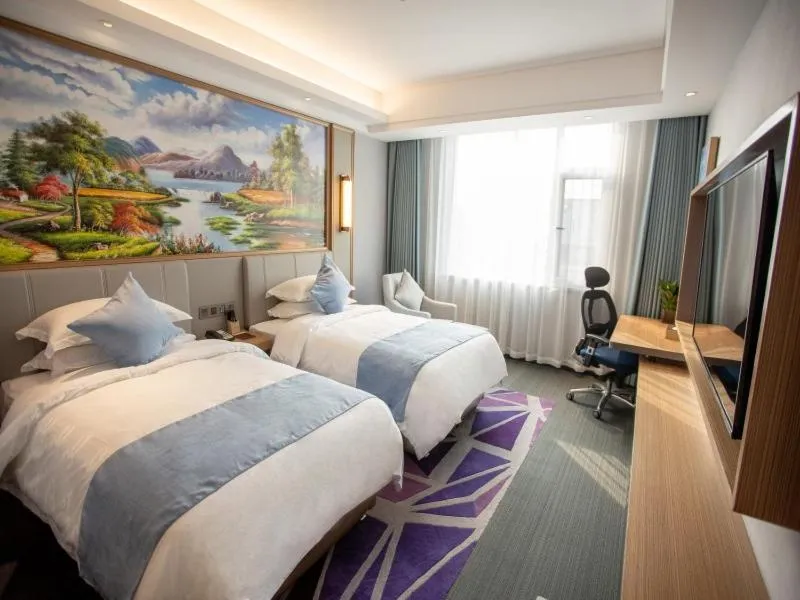 Bed in GreenTree Eastern Hotel Binzhou Zhonghai International Convention and Exhibition Center