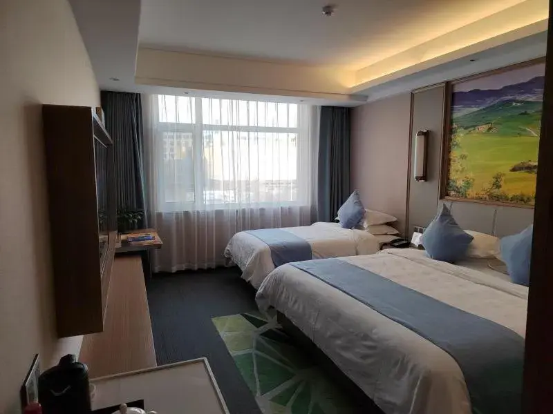 Bed in GreenTree Eastern Hotel Hainan Free Trade Port Jiangdong New District Meilan Airport Bed in GreenTree Eastern Hotel Hainan Free Trade Port Jiangdong New District Meilan Airport