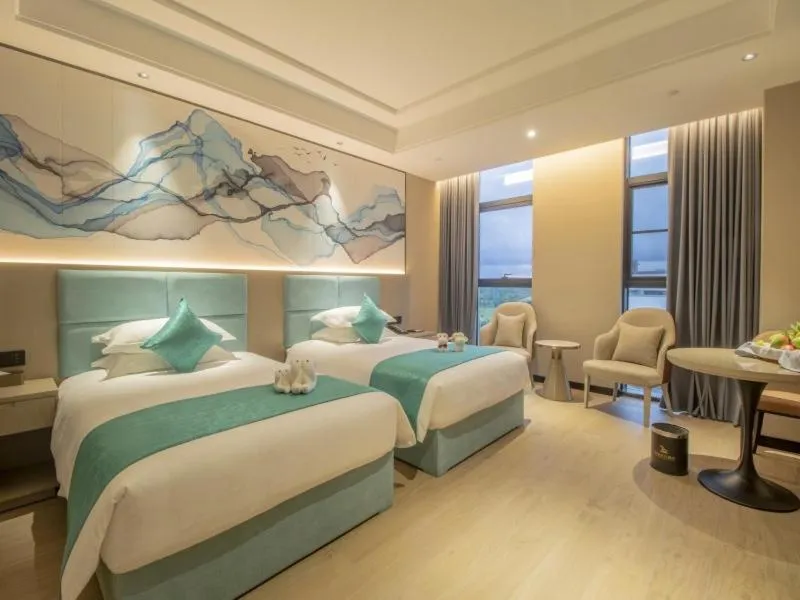 Bed in GreenTree Eastern Hotel Hainan Free Trade Port Jiangdong New District Meilan Airport