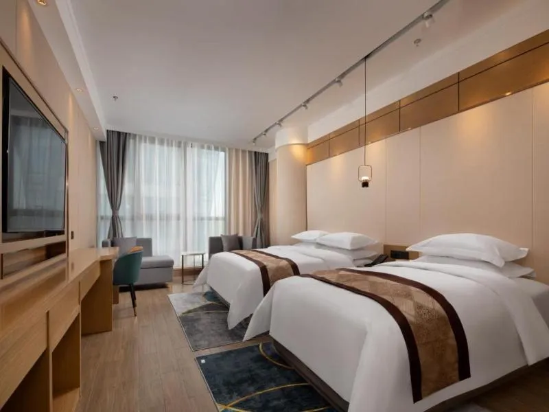 Bed in GreenTree Eastern Hotel Tianjin Wuqing Wanda Plaza
