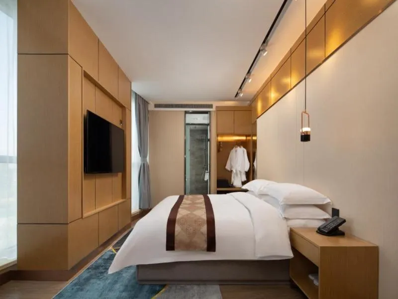 Bed in GreenTree Eastern Hotel Tianjin Wuqing Wanda Plaza