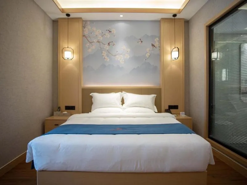 Bed in GreenTree Eastern Hotel Henan Anyang Hua County Wuzhou New Times Square