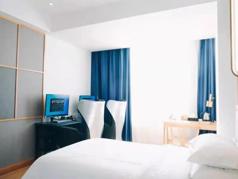 Bed in GreenTree Eastern Hotel Henan Anyang Hua County Wuzhou New Times Square