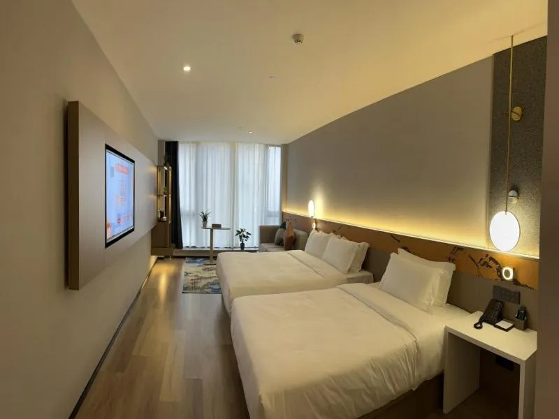 Bed in GreenTree Eastern Hotel Yiwu International Trade City