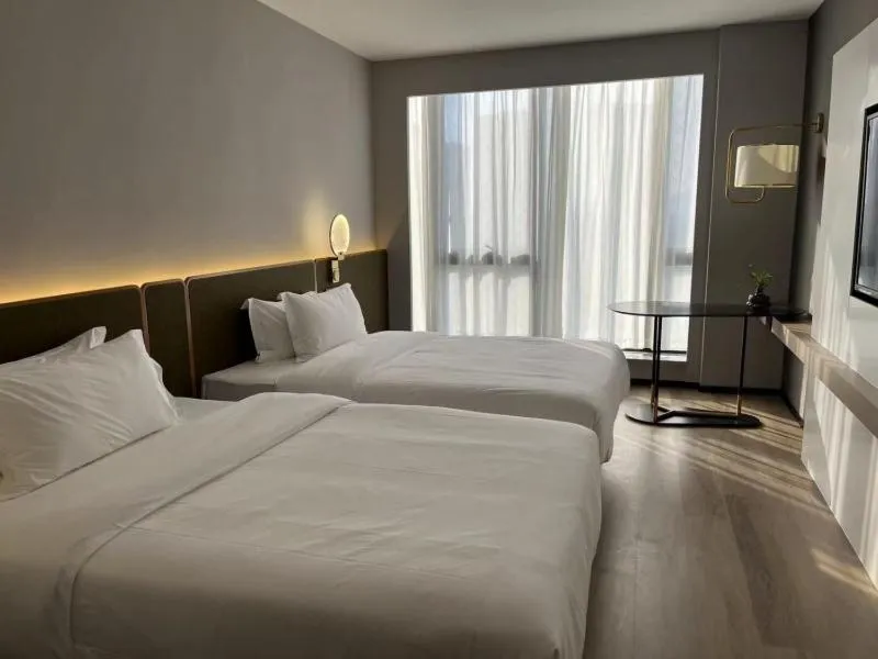 Bed in GreenTree Eastern Hotel Yiwu International Trade City