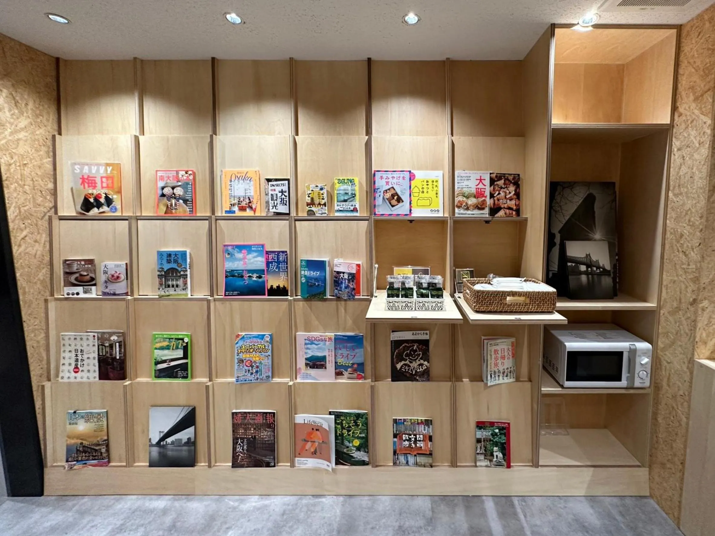 Seating area in CHECKinn Osaka Shinimamiya