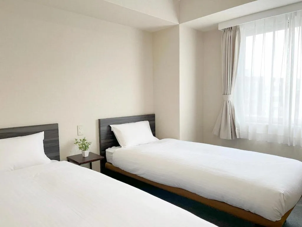 Photo of the whole room, Bed in CHECKinn Osaka Shinimamiya