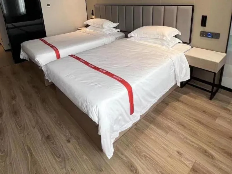 Bed in GreenTree Eastern Hotel Fuyang Jieshou Railway Station East Xinyang Road