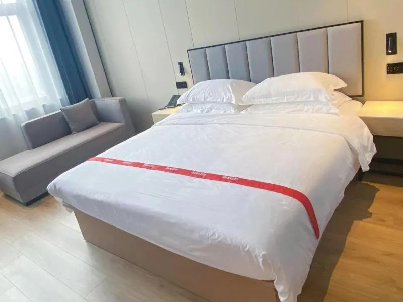 Bed in GreenTree Eastern Hotel Fuyang Jieshou Railway Station East Xinyang Road