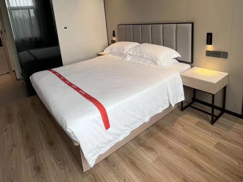 Bed in GreenTree Eastern Hotel Fuyang Jieshou Railway Station East Xinyang Road
