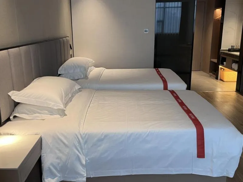 Bed in GreenTree Eastern Hotel Fuyang Jieshou Railway Station East Xinyang Road