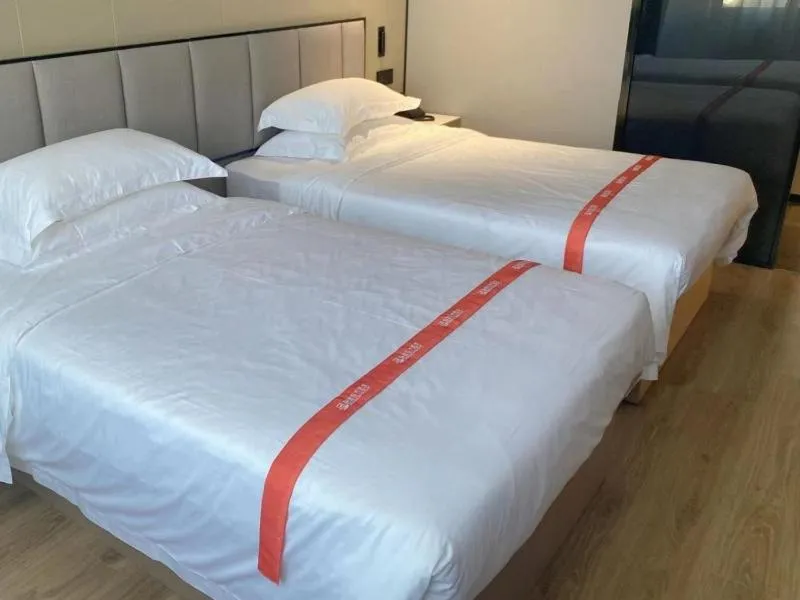 Bed in GreenTree Eastern Hotel Fuyang Jieshou Railway Station East Xinyang Road