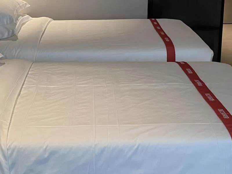 Bed in GreenTree Eastern Hotel Fuyang Jieshou Railway Station East Xinyang Road