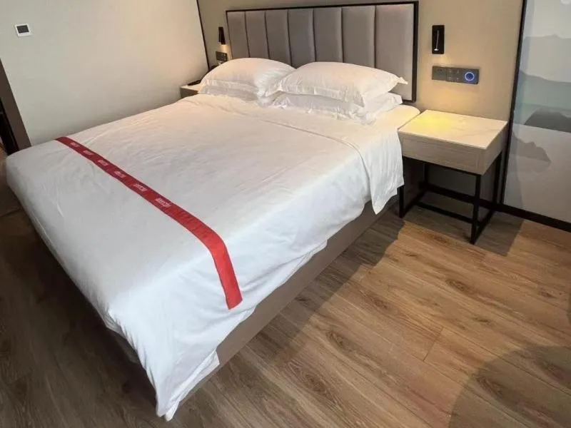 Bed in GreenTree Eastern Hotel Fuyang Jieshou Railway Station East Xinyang Road
