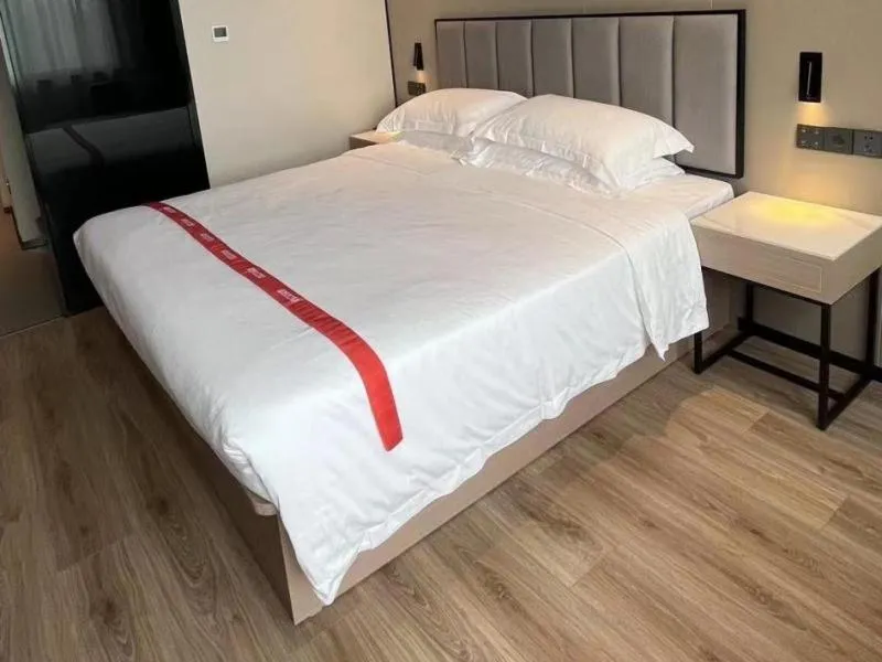 Bed in GreenTree Eastern Hotel Fuyang Jieshou Railway Station East Xinyang Road