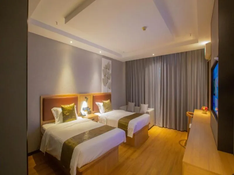 Bed in GreenTree Inn Express Changzhou Caoqiao Industrial Park