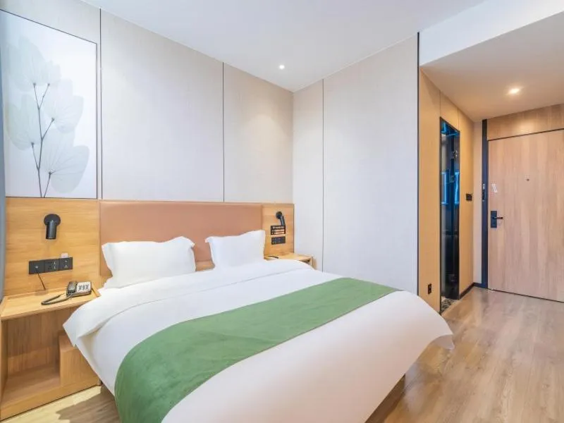 Bed in GreenTree Inn Express Changzhou Caoqiao Industrial Park