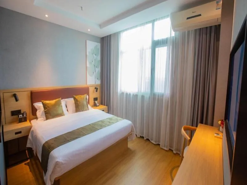 Bed in GreenTree Inn Express Changzhou Caoqiao Industrial Park
