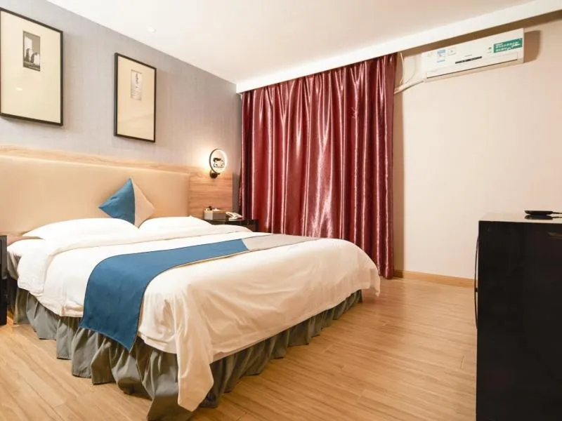 Bed in GreenTree Inn Shenzhen Buji Changlong Subway Station