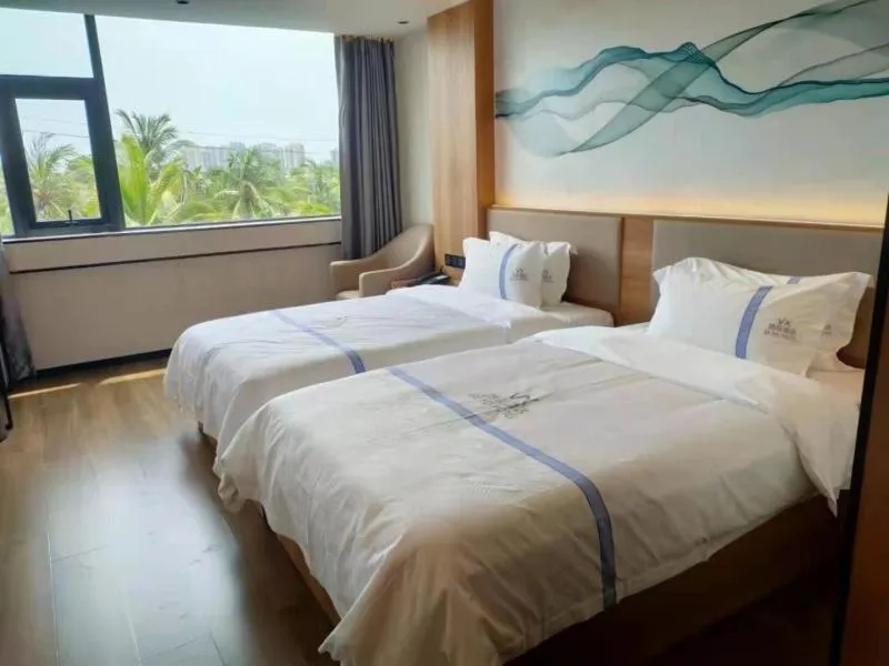 Bed in GreenTree Inn Shenzhen Buji Changlong Subway Station