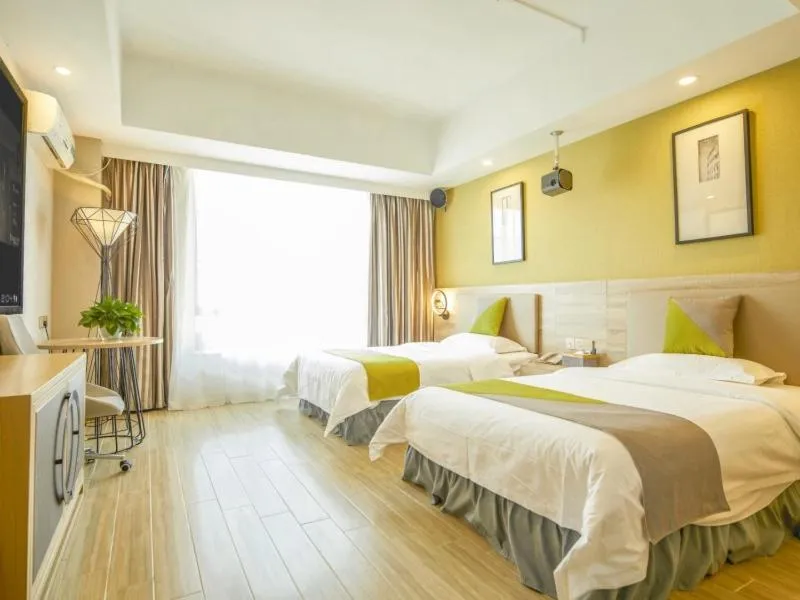 Bed in GreenTree Inn Shenzhen Buji Changlong Subway Station