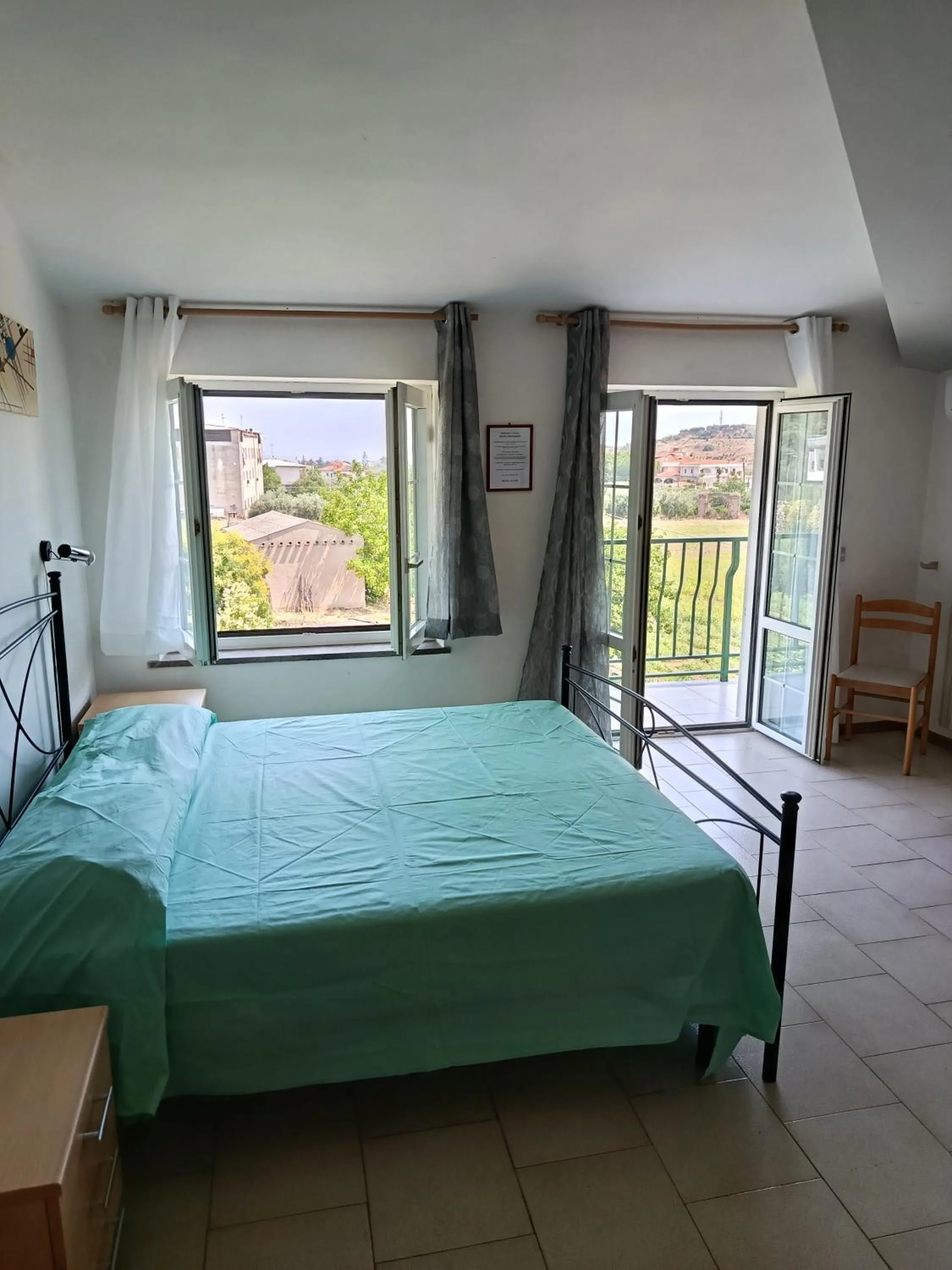 Quadruple Room with Terrace in Bed and Breakfast L' Aranciera