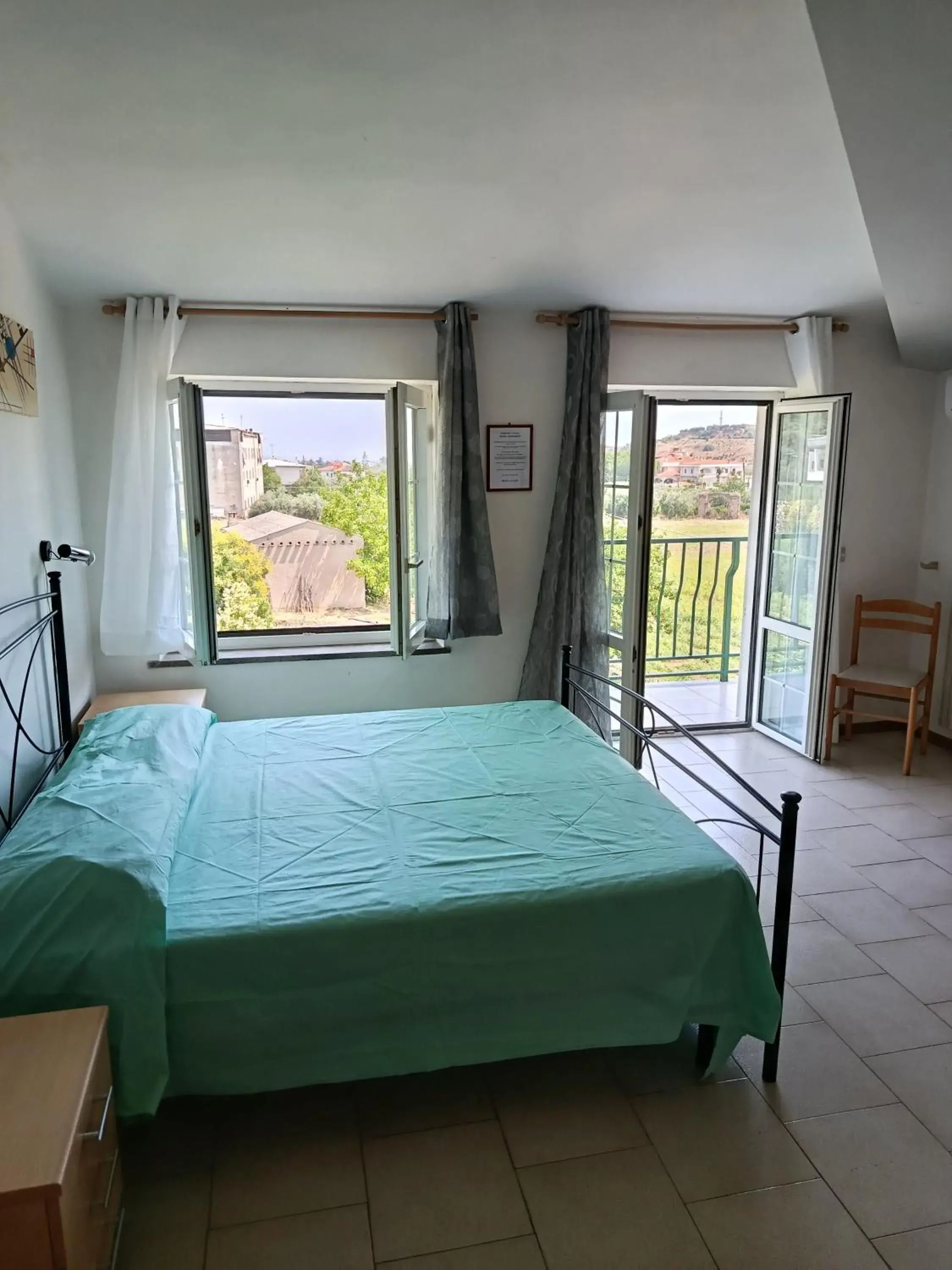 Quadruple Room with Terrace in Bed and Breakfast L' Aranciera Quadruple Room with Terrace in Bed and Breakfast L' Aranciera