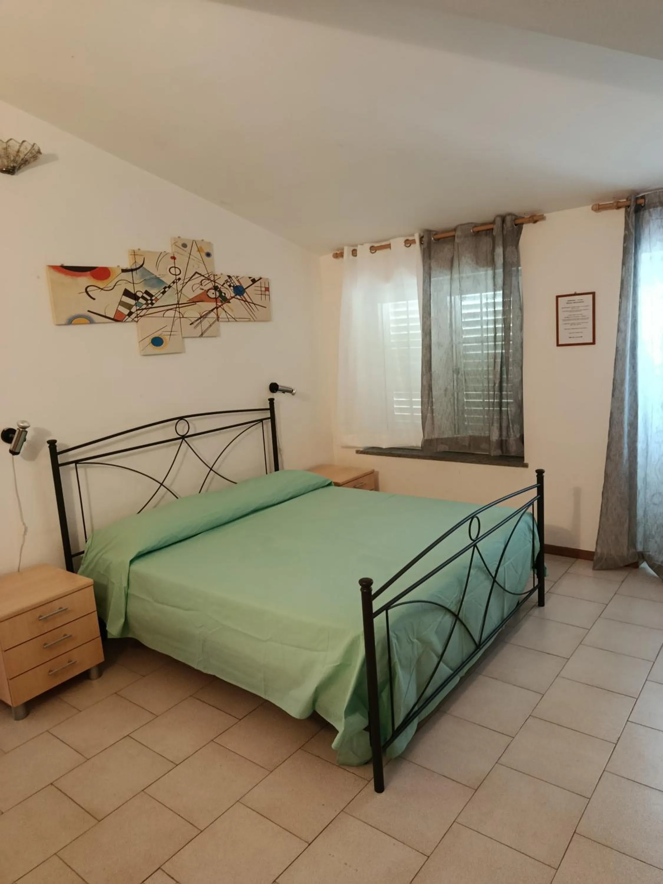 Quadruple Room with Terrace in Bed and Breakfast L' Aranciera