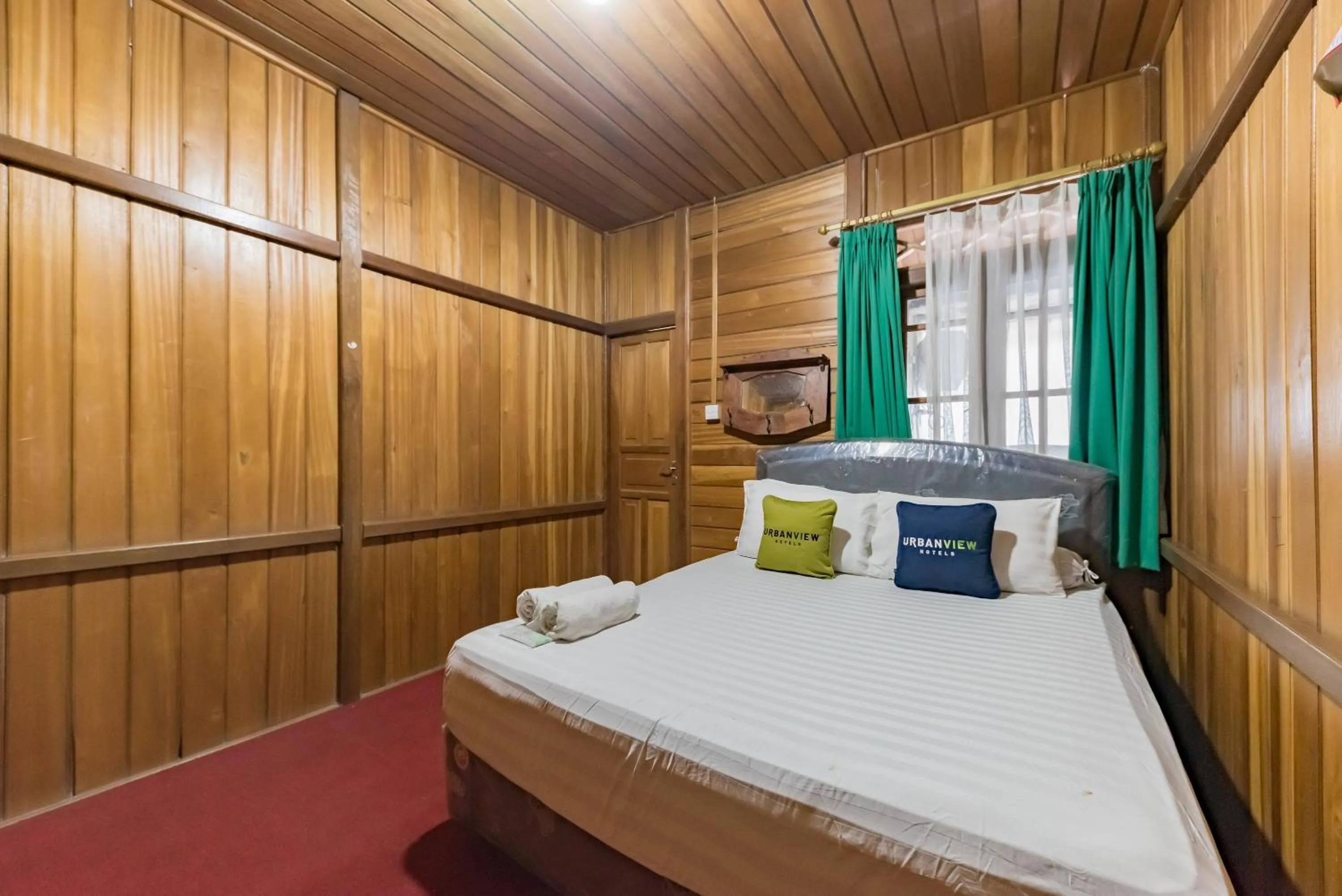 Bed in Urbanview Resort Anty Cisarua Tugu Puncak by RedDoorz