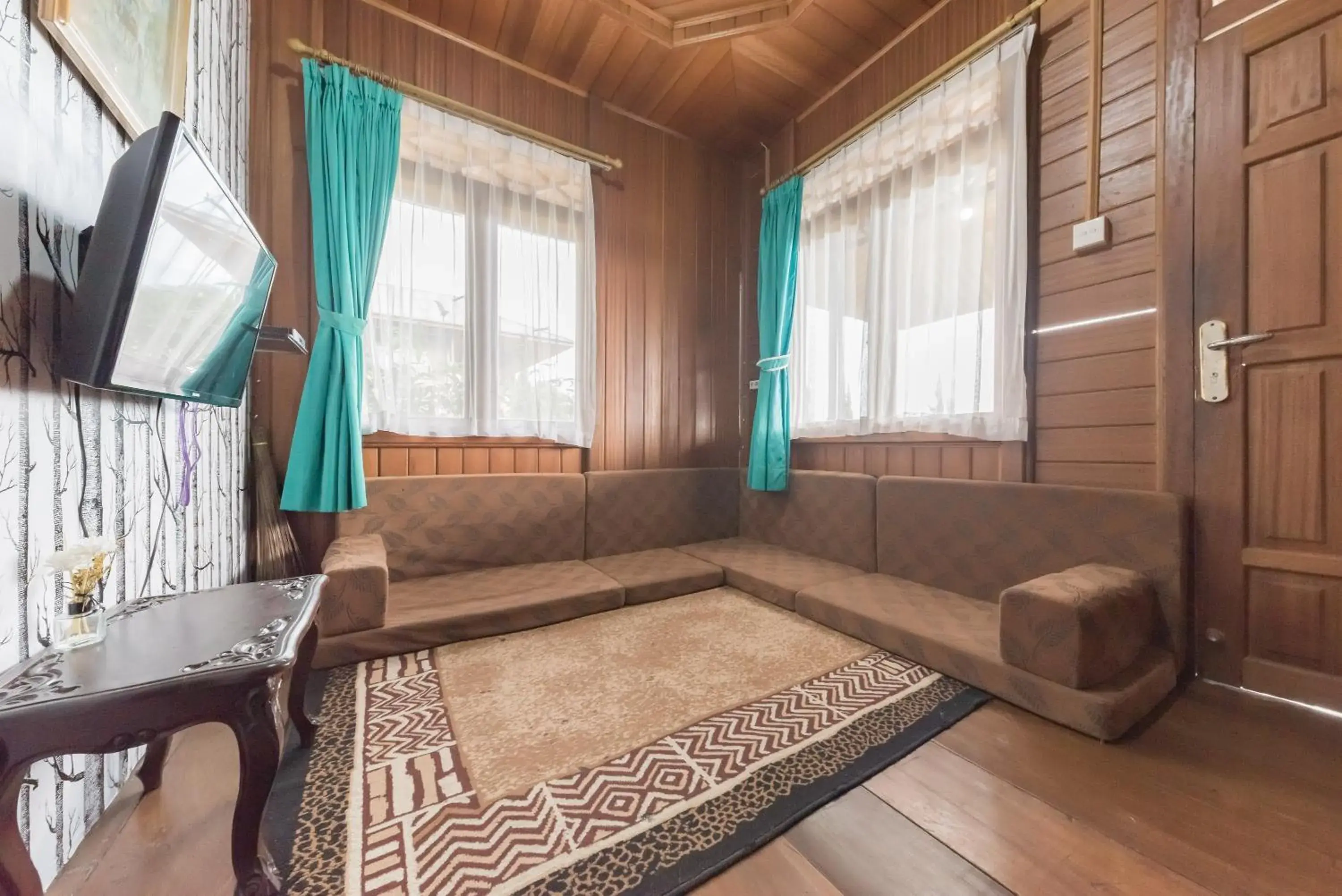 Living room in Urbanview Resort Anty Cisarua Tugu Puncak by RedDoorz Living room in Urbanview Resort Anty Cisarua Tugu Puncak by RedDoorz