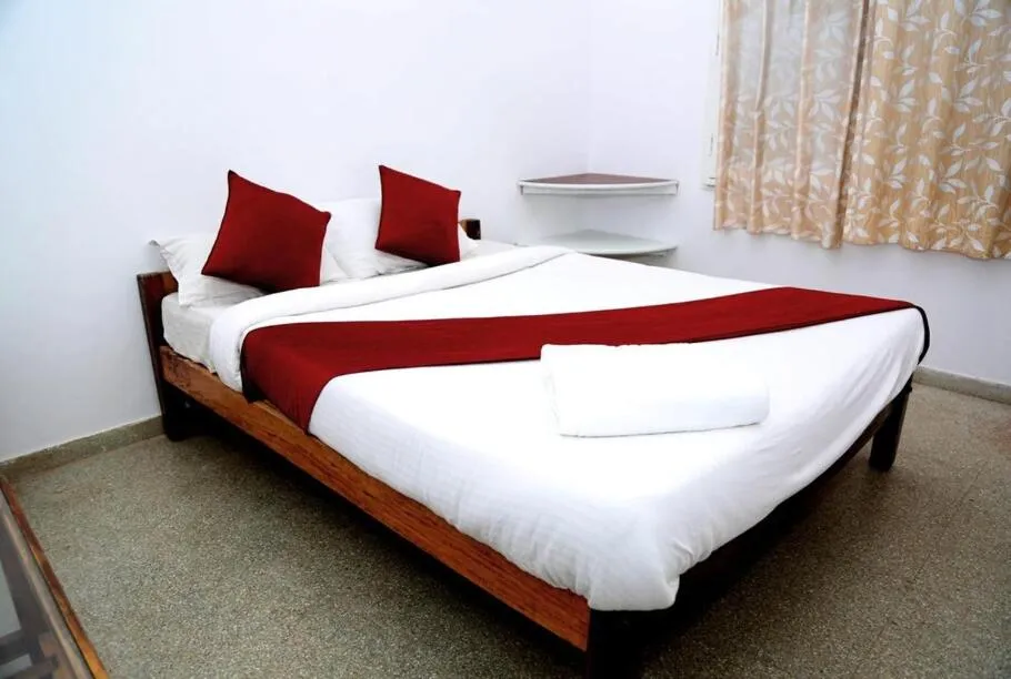 Bedroom in Mothers Bounty by Lazo , Coorg