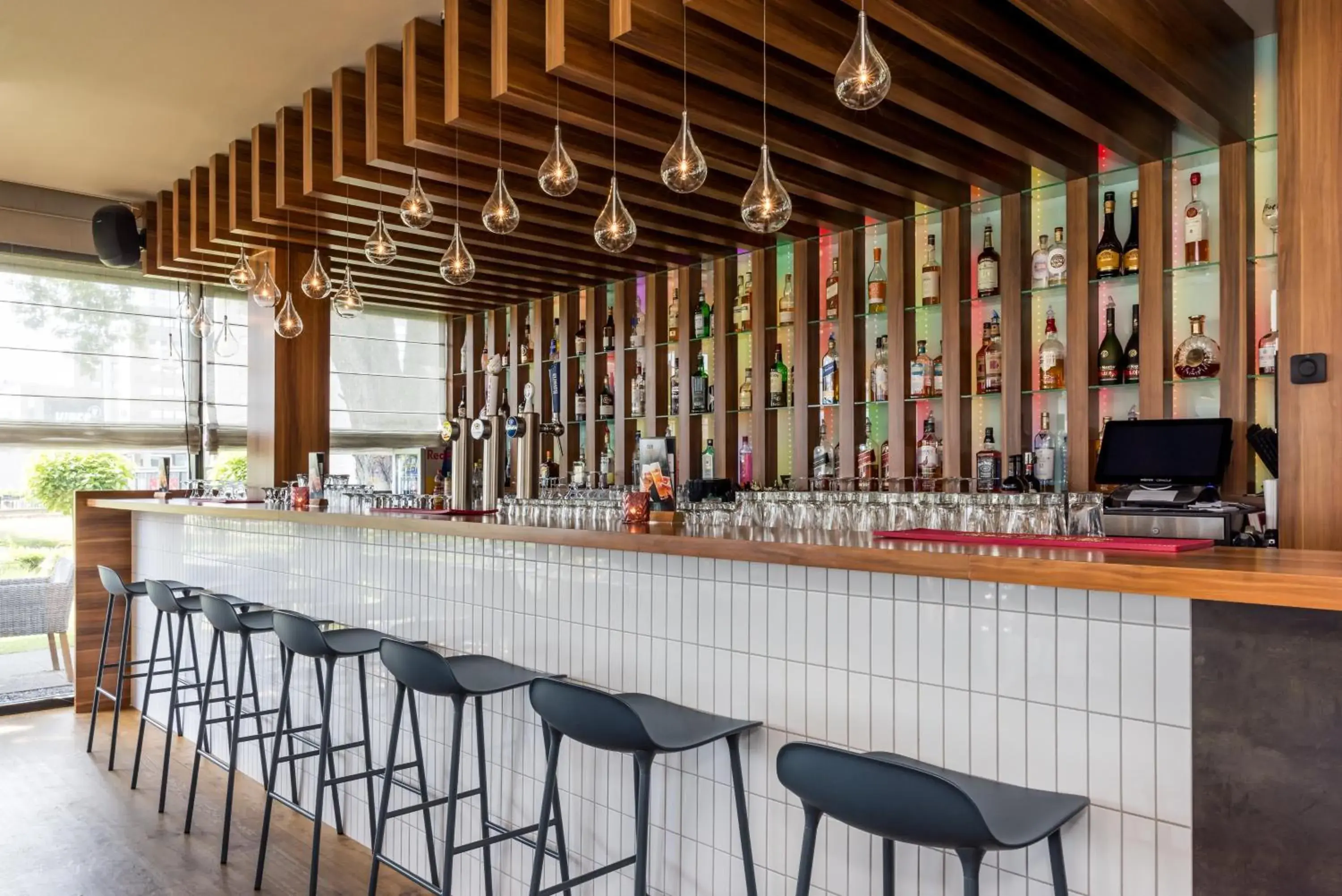 Lounge or bar in Holiday Inn Eindhoven Centre by IHG Lounge or bar in Holiday Inn Eindhoven Centre by IHG