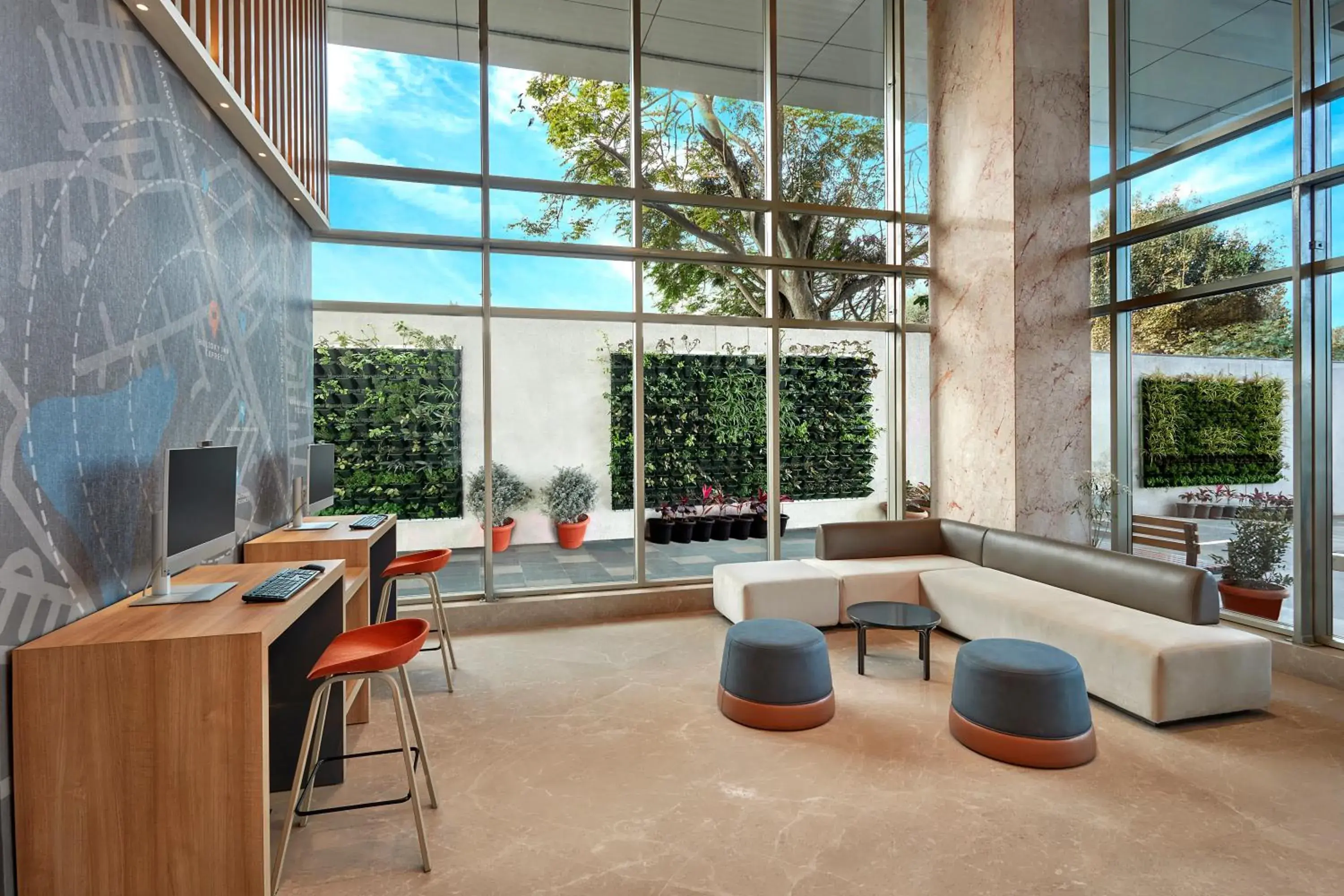 Lobby or reception in Holiday Inn Express Bengaluru Bommasandra by IHG Lobby or reception in Holiday Inn Express Bengaluru Bommasandra by IHG