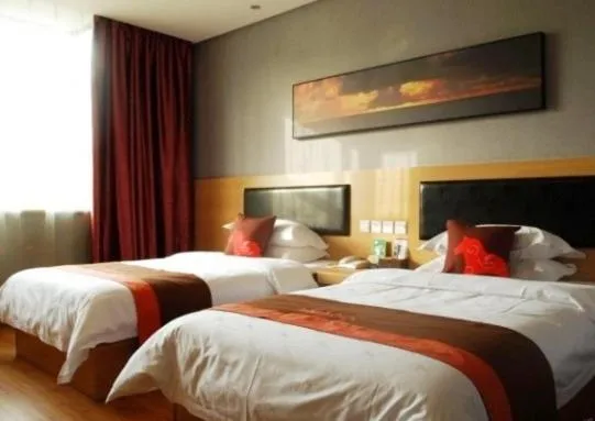 Bed in Junyi Hotel Jinhua Wuyi Hot Spring Bus Terminal Station