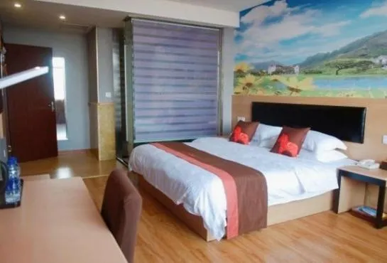 Bed in Junyi Hotel Jinhua Wuyi Hot Spring Bus Terminal Station