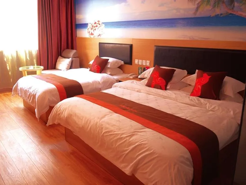 Bed in Junyi Hotel Jinhua Wuyi Hot Spring Bus Terminal Station