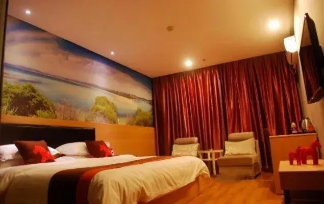 Bed in Junyi Hotel Jinhua Wuyi Hot Spring Bus Terminal Station Bed in Junyi Hotel Jinhua Wuyi Hot Spring Bus Terminal Station