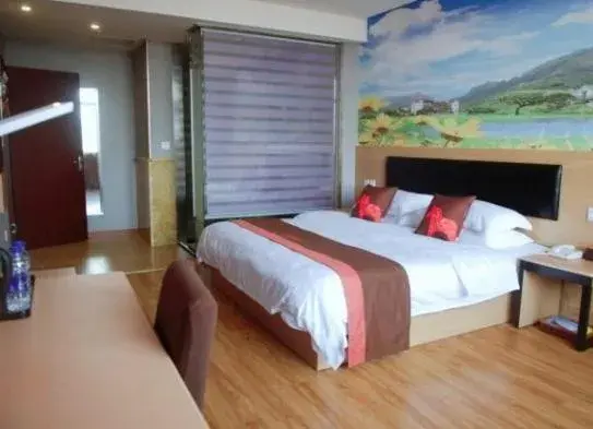 Bed in Junyi Hotel Jinhua Wuyi Hot Spring Bus Terminal Station Bed in Junyi Hotel Jinhua Wuyi Hot Spring Bus Terminal Station