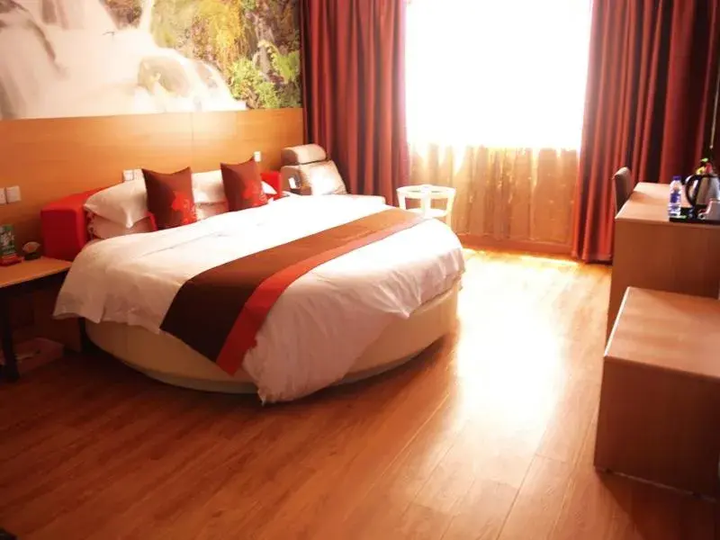 Bed in Junyi Hotel Jinhua Wuyi Hot Spring Bus Terminal Station Bed in Junyi Hotel Jinhua Wuyi Hot Spring Bus Terminal Station