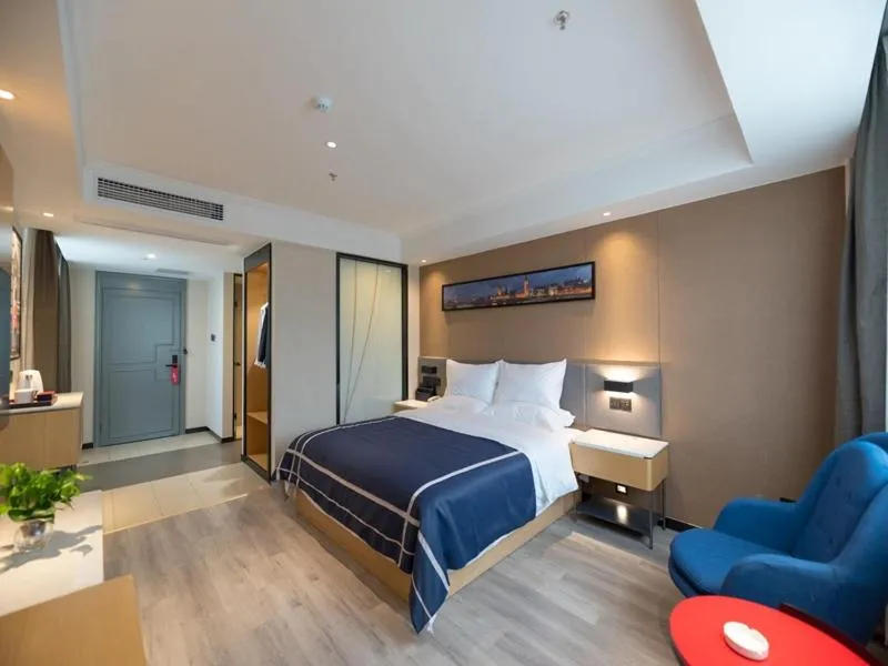 Bed in LanOu Hotel Wuxi Anzhen East High-Speed Railway Station