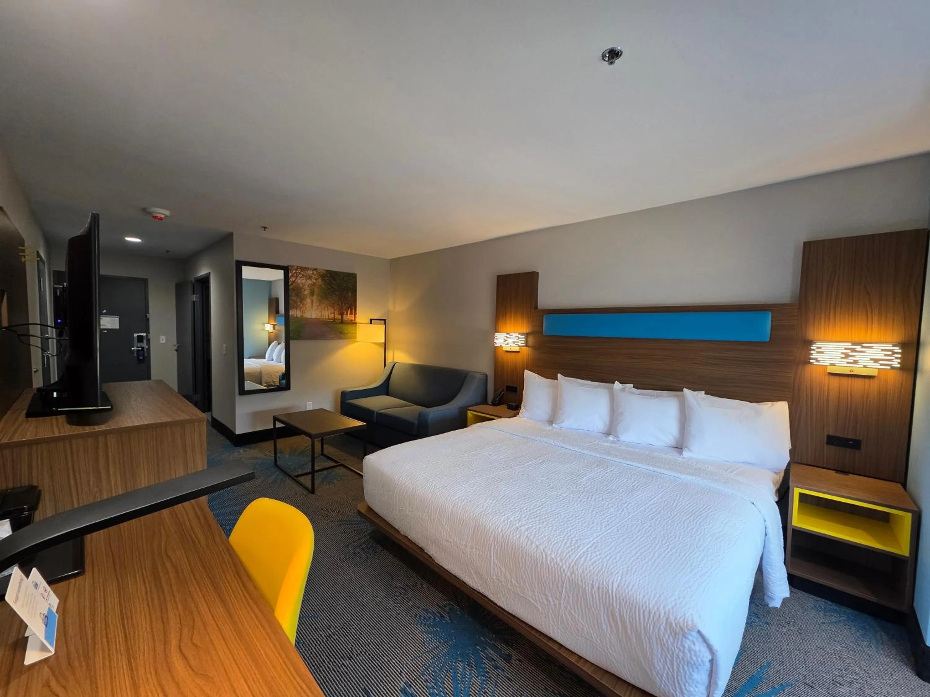 Bed in Days Inn & Suites by Wyndham Brandon Amphitheater